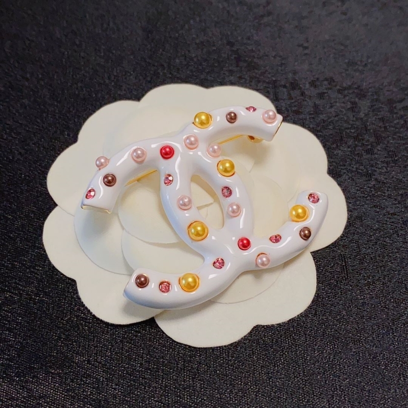 Ch**el brooches